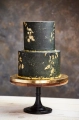 2023-03-01 10_10_42-Premium Photo _ Elegant black and gold wedding cake with a modern and luxurious .png