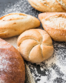 2023-02-20 15_10_12-Free Photo _ Fresh bread loafs on table.png