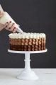 2023-02-16 20_50_50-person holding white ice cream cone with brown and white round cake photo – Free.png